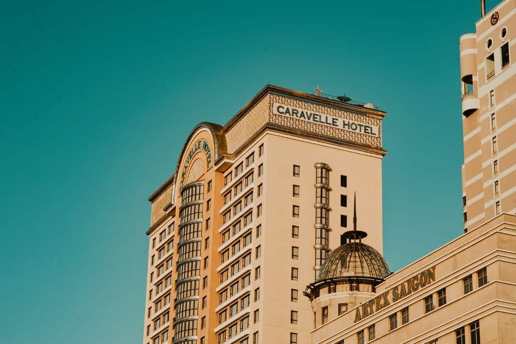 The exterior of a large hotel.