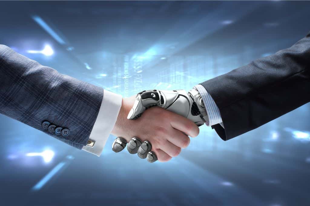 Man shaking hands with a robot