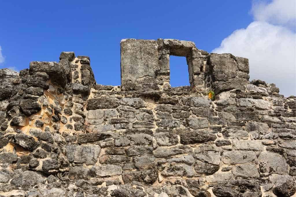 Stone ruins at San Gervasio in front of a blue sky.