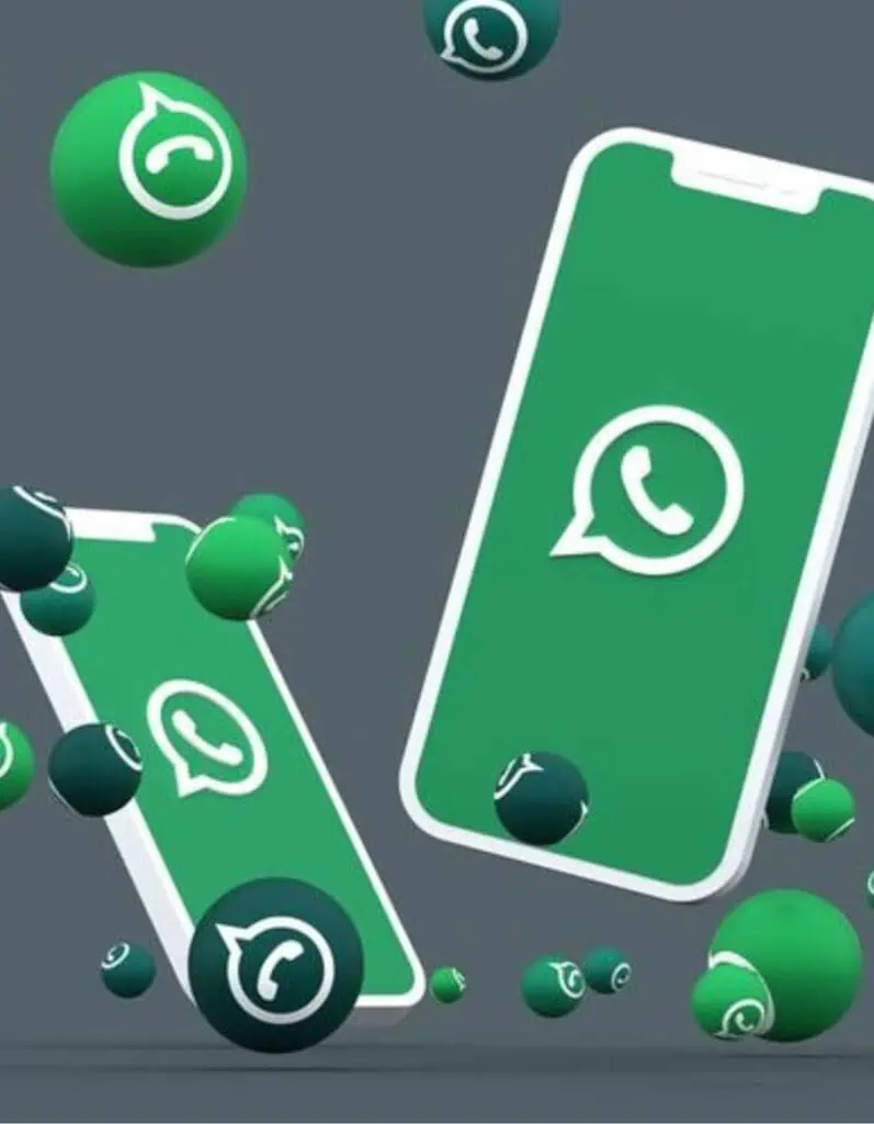 Digital illustration featuring two smartphones with green screens displaying the WhatsApp logo, surrounded by floating 3D spheres also marked with the WhatsApp icon. The gray background and dynamic layout emphasize the app’s widespread digital presence and connectivity theme.
